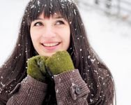 pic for Brunette With Green Gloves In Snow 